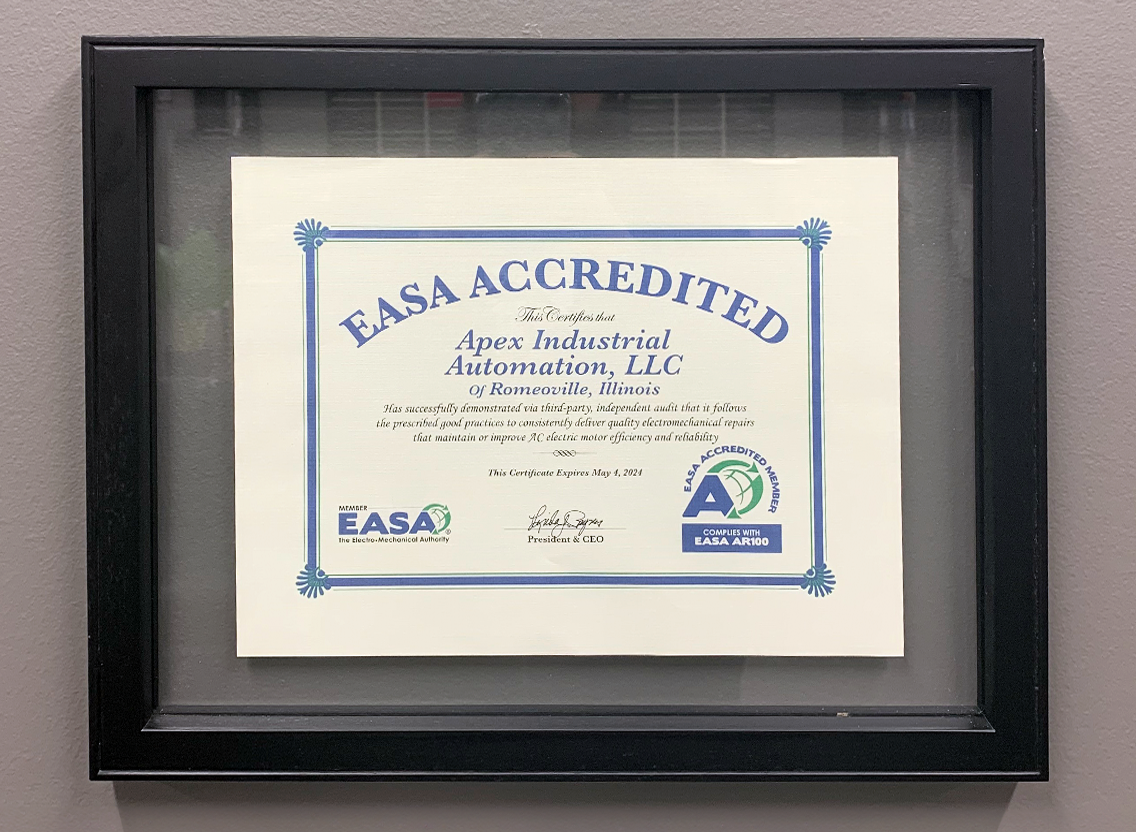 EASA Accredited certification plaque displayed in the office of Apex Industrial Automation.