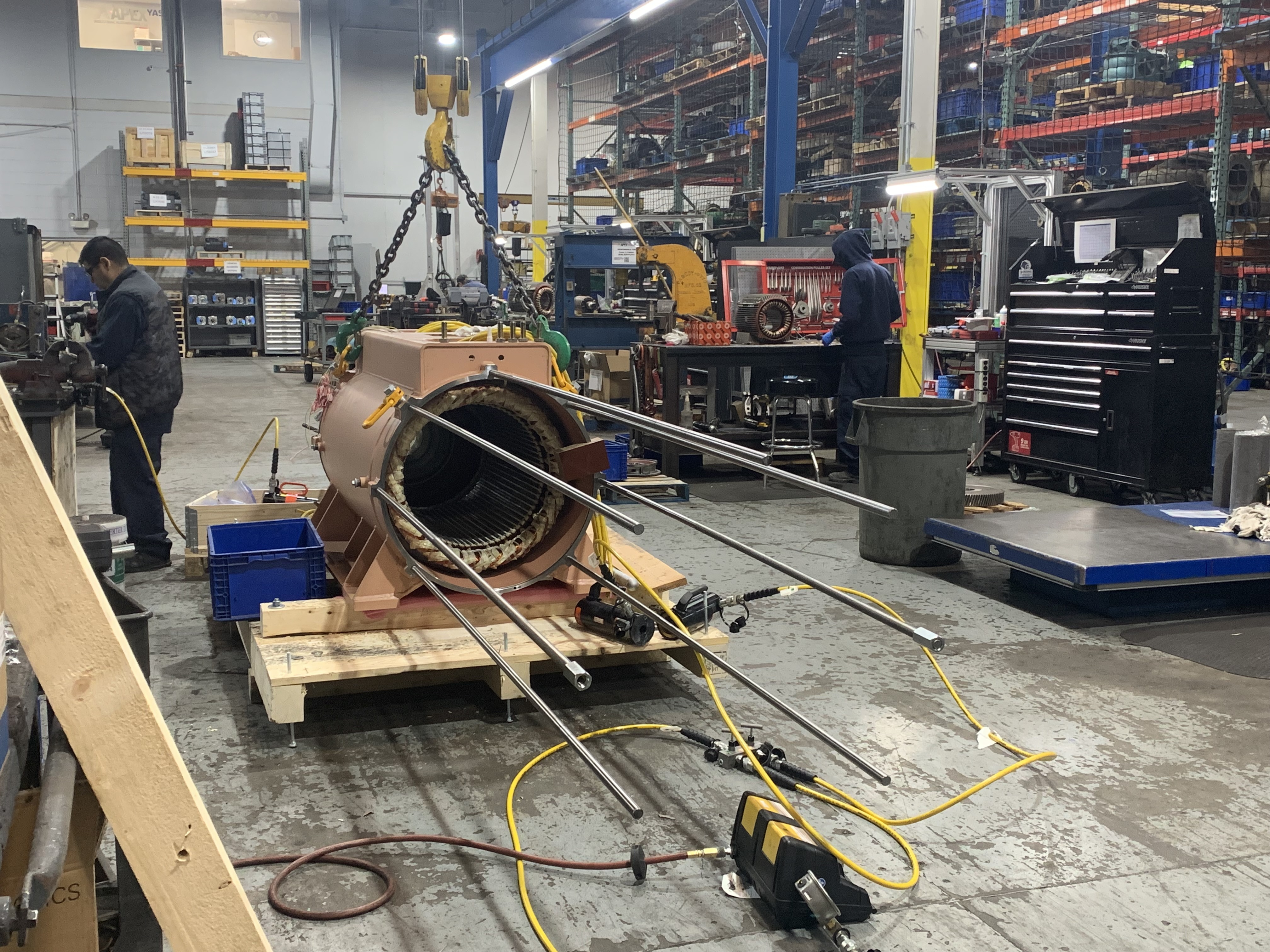 Repairing a multi-ton Embedded Magnetic-Rotor Motor at Apex Industrial Automation, using guides to slide the magnetic rotor back into place.