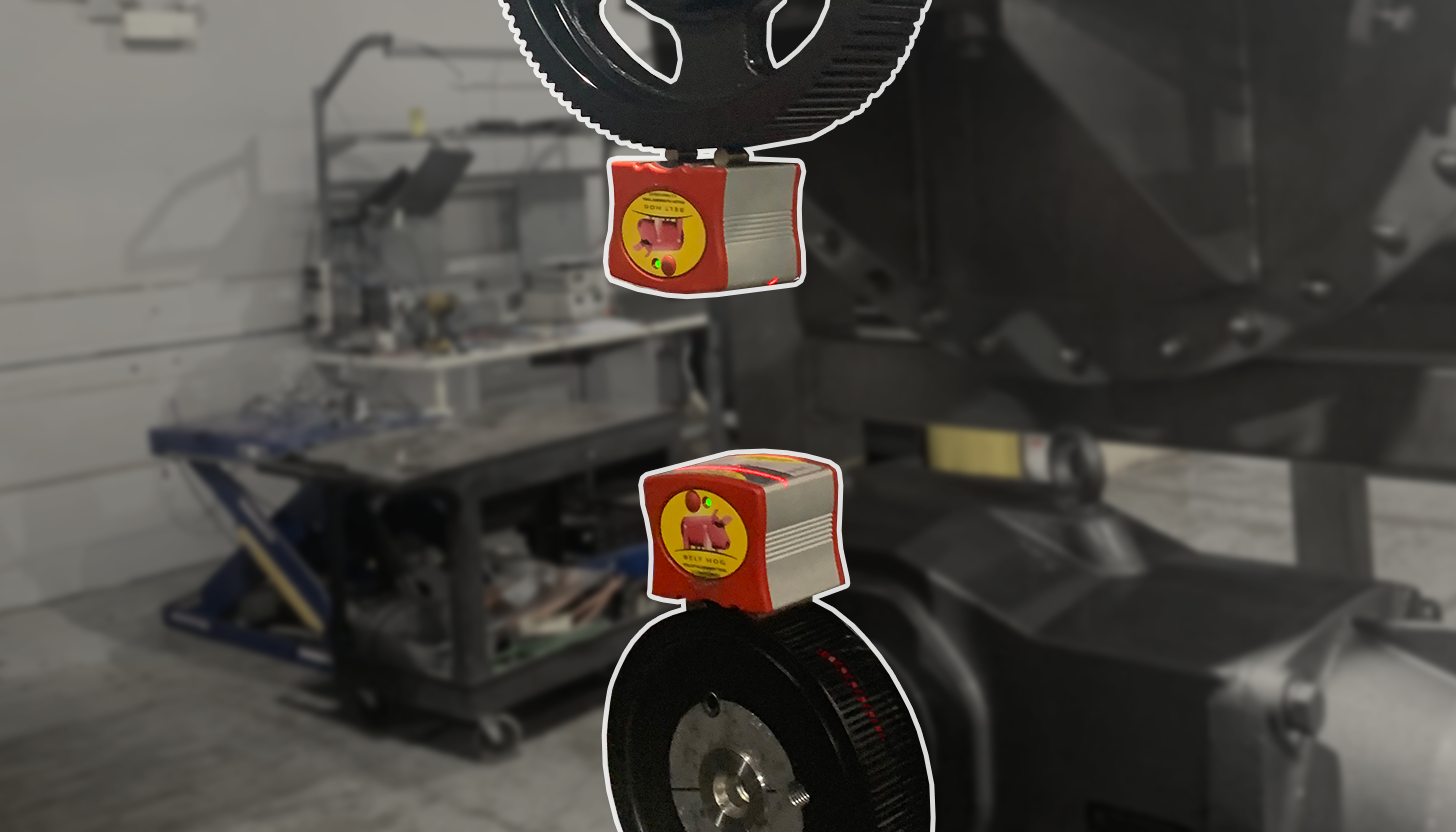 Laser alignment of belting sheaves on a custom industrial blender at Apex Industrial Automation, critical for precise industrial belting.
