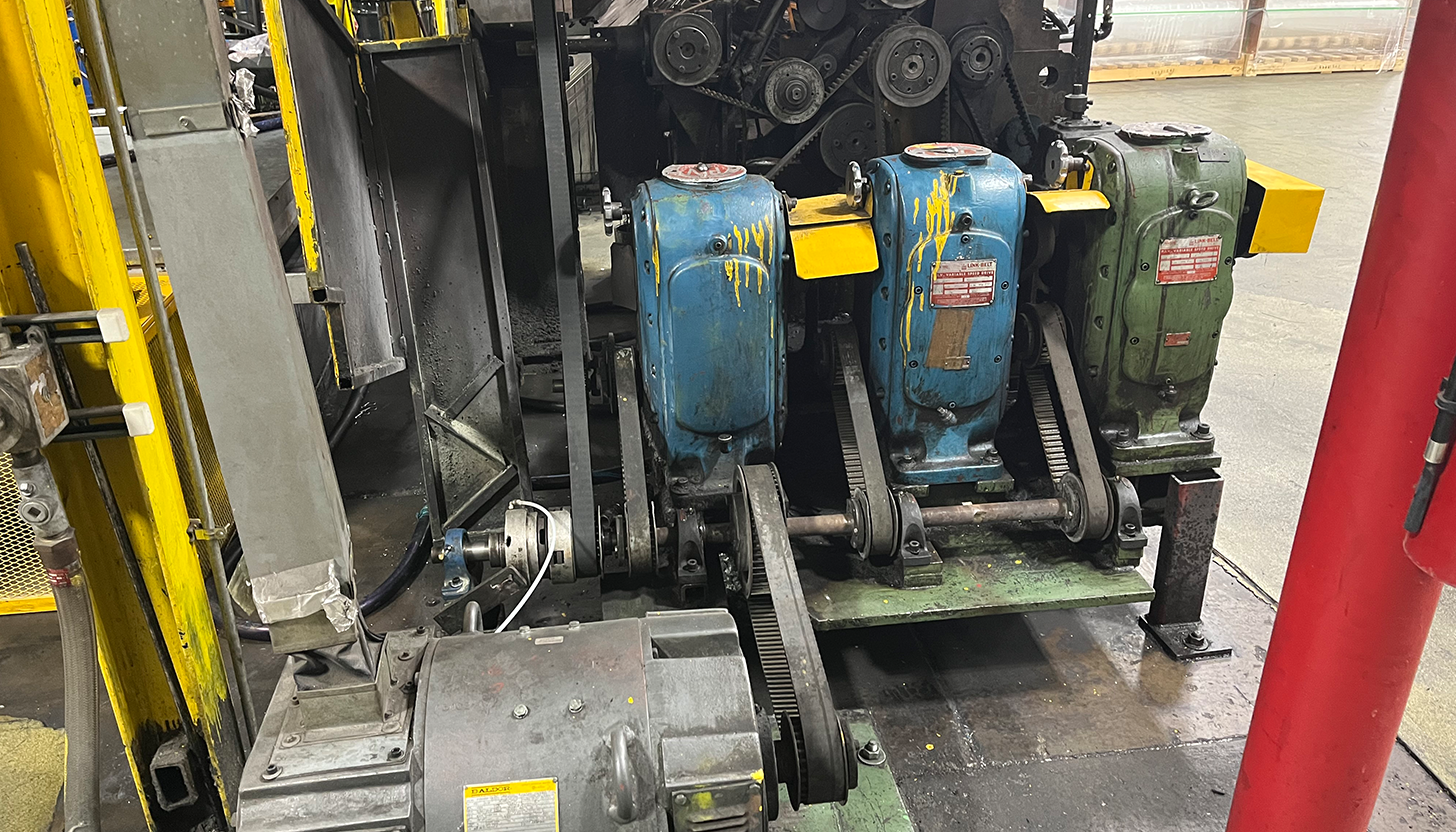 A Before image for a retrofitting and system integration testimonial for Apex Industrial Automation showing Link Belt PIV variable speed drive units with exposed belting and paint issues.