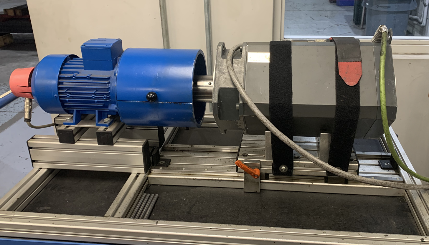 SIEMENS dynamometer torque test workbench with a servo motor strapped in for diagnostic testing at Apex Industrial Automation.
