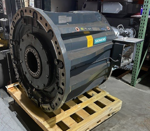 Large SIEMENS industrial motor with long fins on the housing, demonstrating Apex Industrial Automation's specialty repair capabilities.